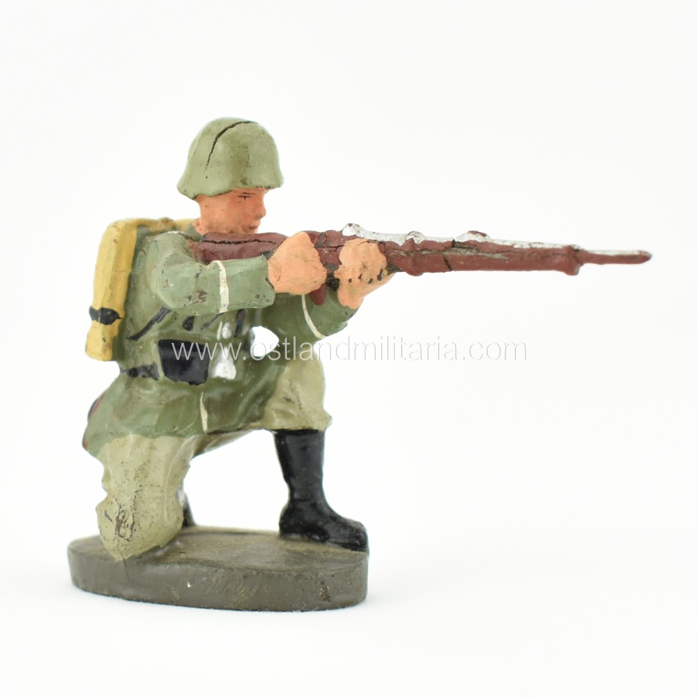 German Elastolin toy soldier with a rifle, kneeling shooting position Germany 1933–1945