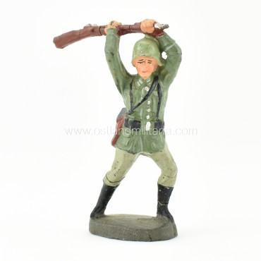 German Elastolin toy soldier with a rifle, hand-to...