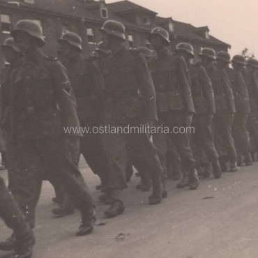 Photo of Latvian SS volunteers marching Germany 1933–1945